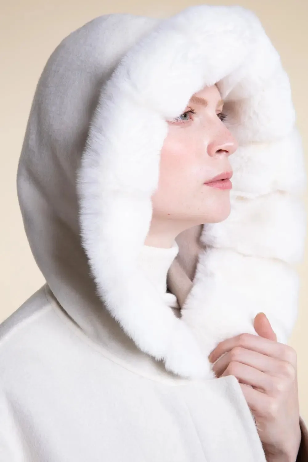 White winter coat with fur hood